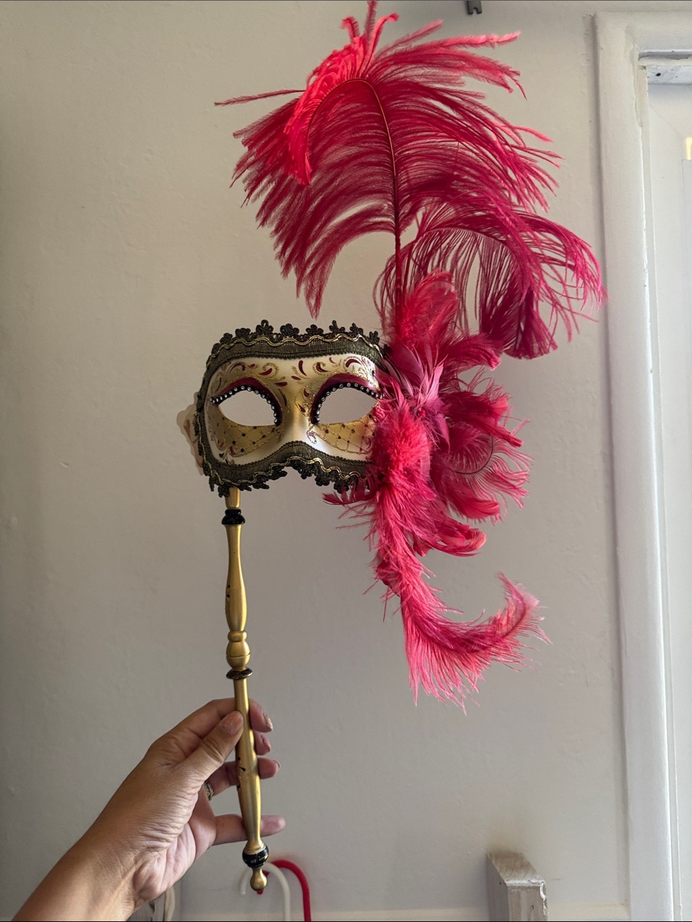Gold Venetian Handheld Mask with Red Feather Accent